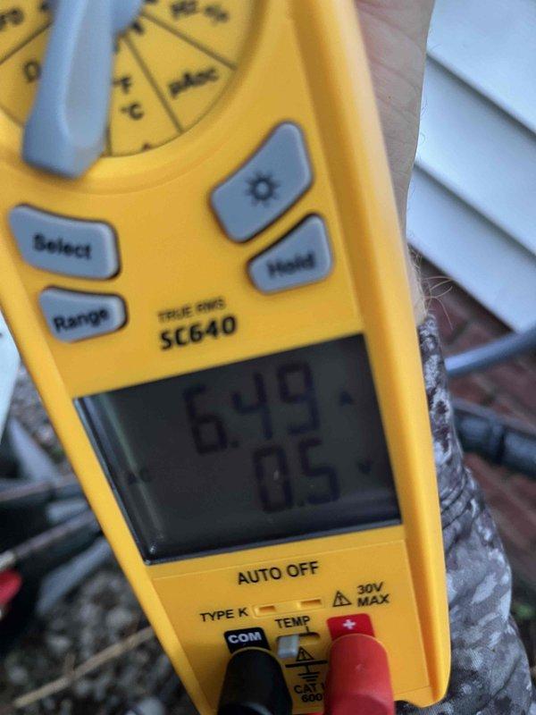 Performed cooling maintenance member visit for complaint of new unit running loud. Conducted diagnostic testing using digital multimeter to measure electrical parameters and temperature readings at outdoor condensing unit. Verified system operation and documented measurements showing normal amperage draw and temperature differential. Unit operating within manufacturer specifications despite noise concern.