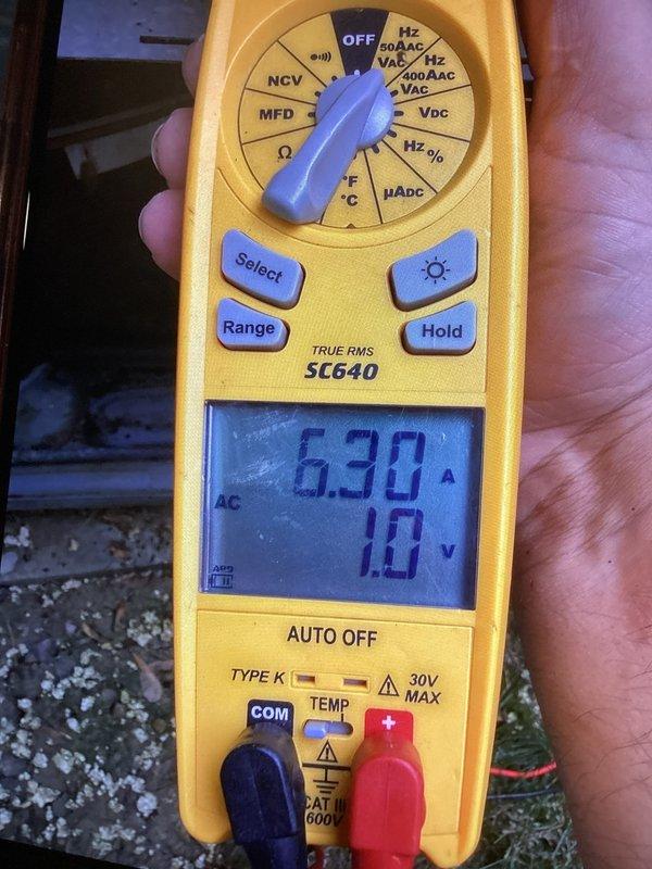 Responded to no cooling call on air conditioning unit less than 10 years old. Upon arrival, found capacitor had failed, preventing compressor from starting despite thermostat displaying properly. Tested capacitor with multimeter, confirming readings outside acceptable range. Replaced defective dual run capacitor, cleaned debris accumulation from unit base, and verified system operation. Unit restored to normal cooling function with proper amperage draw and voltage readings confirmed.