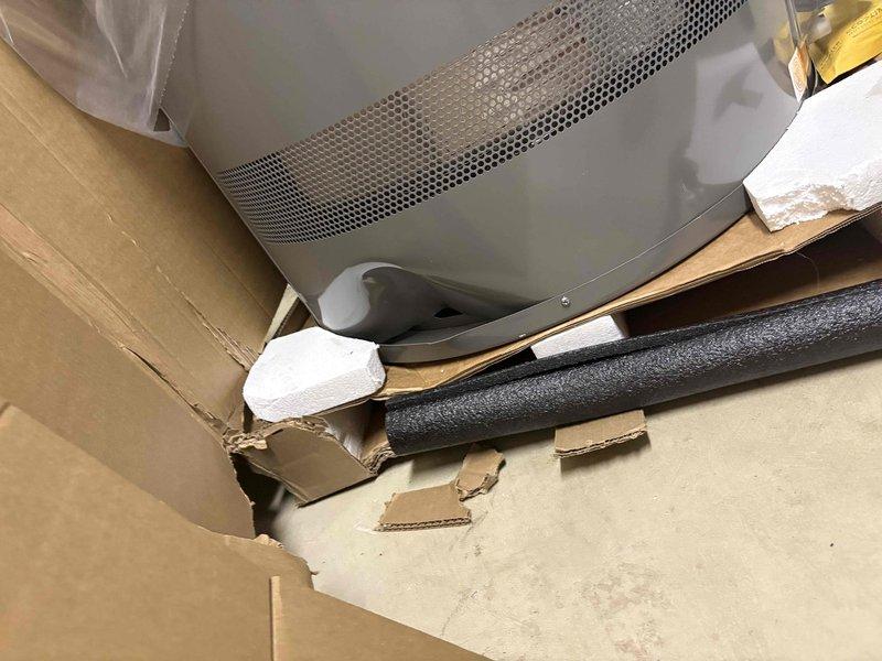 Installed customer-supplied water heater and properly repiped both water heaters with new copper piping and brass fittings to ensure proper water distribution throughout the system. Added thermal expansion tank to protect against pressure buildup, then removed and hauled away the old corroded water heater, leaving the utility area clean with all packaging materials properly disposed of.