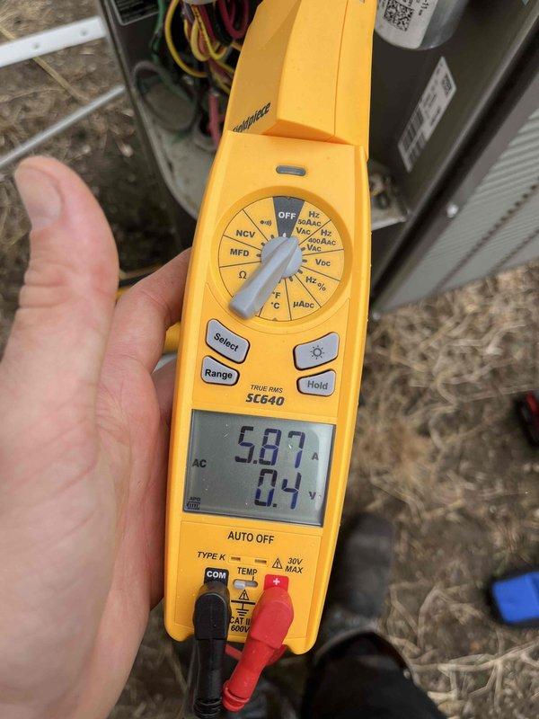 Completed cooling tune-up on air handler unit. Performed electrical diagnostics using digital multimeter, verifying voltage readings and system parameters. All measurements within normal operating range. Captured documentation of diagnostic readings for service records.