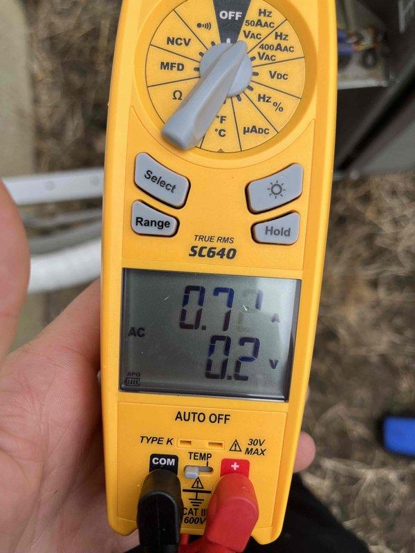 Completed cooling tune-up on air handler unit. Performed electrical diagnostics using digital multimeter, verifying voltage readings and system parameters. All measurements within normal operating range. Captured documentation of diagnostic readings for service records.