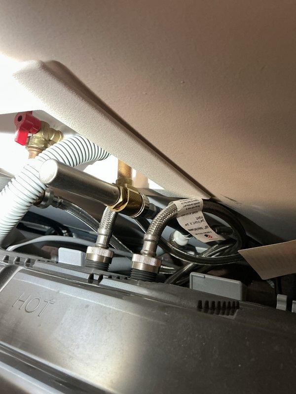 Responded to service call for elevated water and sewer utility bills at three-year-old residential property. Performed comprehensive plumbing system inspection to identify potential leaks or blockages as recommended by municipal utility provider. Conducted visual examination of water heater connections, supply lines, shut-off valves, and accessible plumbing fixtures. Inspected braided stainless steel flex lines, brass fittings, and corrugated supply hoses for signs of deterioration, moisture, or active leaks. Examined mechanical equipment in utility area including pump systems and associated piping. No visible leaks, water damage, or obvious plumbing defects detected during visual inspection. Documented findings with photographic evidence of water heater connections and utility room equipment for customer records.