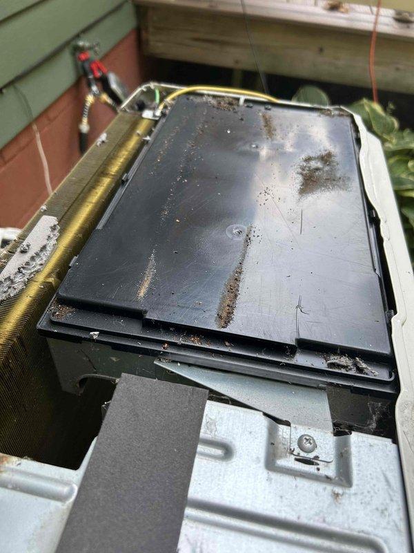 Responded to no-cool call on air handler unit that would not reset. Upon arrival, diagnosed system issue and replaced thermostat battery, which restored system operation. Customer requested to convert service call to preventative maintenance tune-up. Performed complete system inspection of outdoor condensing unit and air handler, including electrical connections, refrigerant levels, and component operation. Documented equipment condition with photos showing electrical terminal connections and outdoor unit. System tested and confirmed operating properly following battery replacement and tune-up completion.