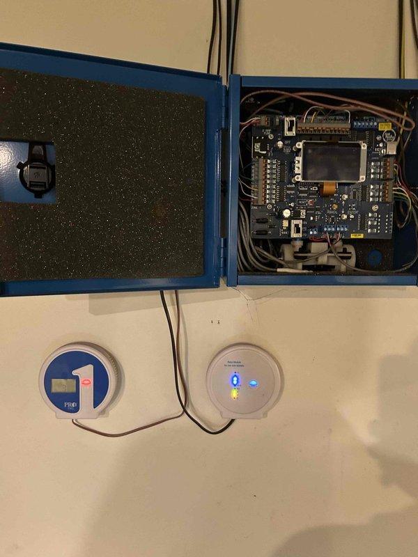 Responded to no cooling call following power surge with clicking sounds reported at air handler. Upon inspection, found furnace and air handler system in basement with electronic control board and zone control system. Evaluated electrical components, control boards, and thermostat wiring for surge damage; verified system safety and proper operation of all HVAC controls and zone dampers before restoring unit to service.