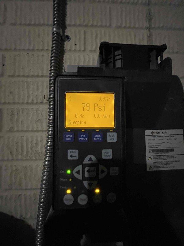 Responded to no water condition following power restoration. Diagnosed well pump system and verified pressure switch operation showing 79 PSI system pressure with pump in sleep mode. Checked electrical panel and measured 23.9 amp draw to confirm proper power supply to pump control system. System restored to normal operation with adequate water pressure throughout property.