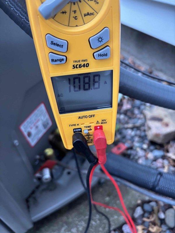 Completed cooling maintenance club visit on air handler system. Performed system diagnostics using digital multimeter, recording voltage reading of 198.8V to verify proper electrical supply to unit. Inspected and evaluated air filter condition, noting moderate to heavy dust and particulate accumulation throughout pleated media, with significant darkening visible in lower sections indicating reduced airflow efficiency. Filter replacement recommended during this preventive maintenance visit to maintain optimal system performance and indoor air quality.