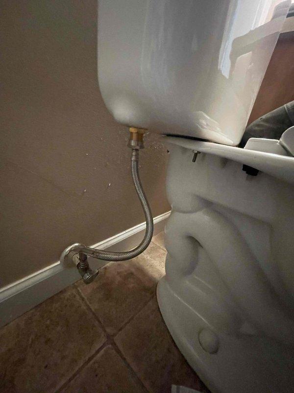 Returned to property to complete fill valve replacement in toilet tank and inspect second toilet as requested. Successfully installed new fill valve assembly, ensuring proper water level adjustment and verifying all connections for leak-free operation. Inspected second toilet fixture, confirmed standard two-piece configuration with existing braided stainless steel supply line and angle stop valve in proper working condition.