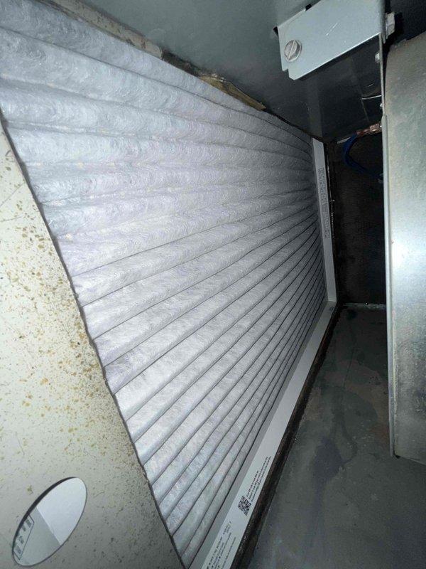 Completed scheduled cooling maintenance for club member's air handler system. Performed comprehensive inspection including temperature diagnostics with readings of 114°F at equipment surfaces, verified proper air filtration with clean pleated filter in good condition, and documented system components including ductwork, electrical connections, and mechanical assemblies. All equipment operating within normal parameters with no deficiencies noted at time of service.