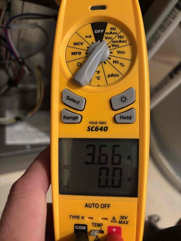 Completed air conditioning tune-up and performance evaluation on recently installed air handler. Performed electrical diagnostics using digital multimeter, measuring system amperage at 5.72A and voltage at 366V to verify proper operating parameters and confirm equipment is functioning within manufacturer specifications.
