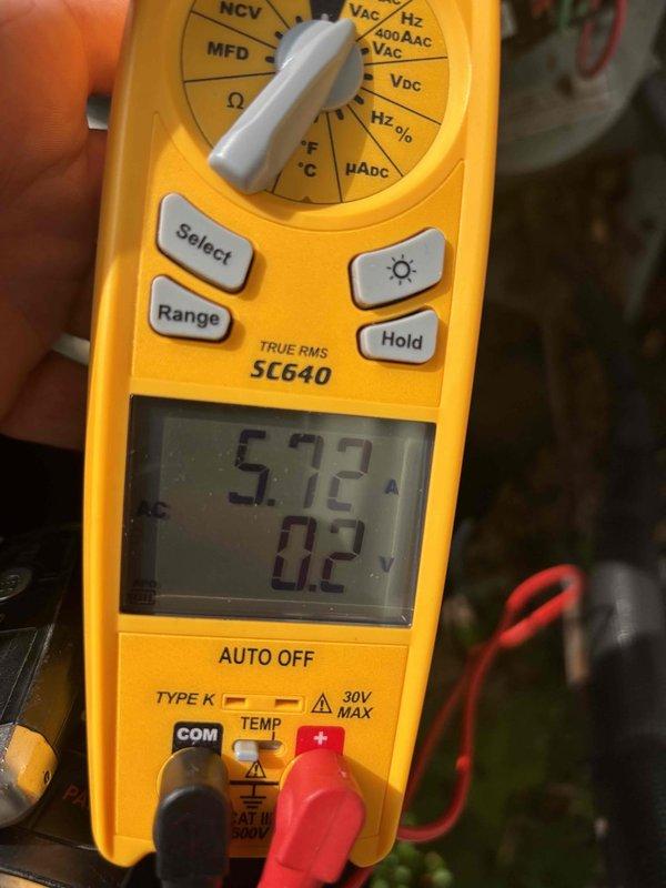 Completed air conditioning tune-up and performance evaluation on recently installed air handler. Performed electrical diagnostics using digital multimeter, measuring system amperage at 5.72A and voltage at 366V to verify proper operating parameters and confirm equipment is functioning within manufacturer specifications.