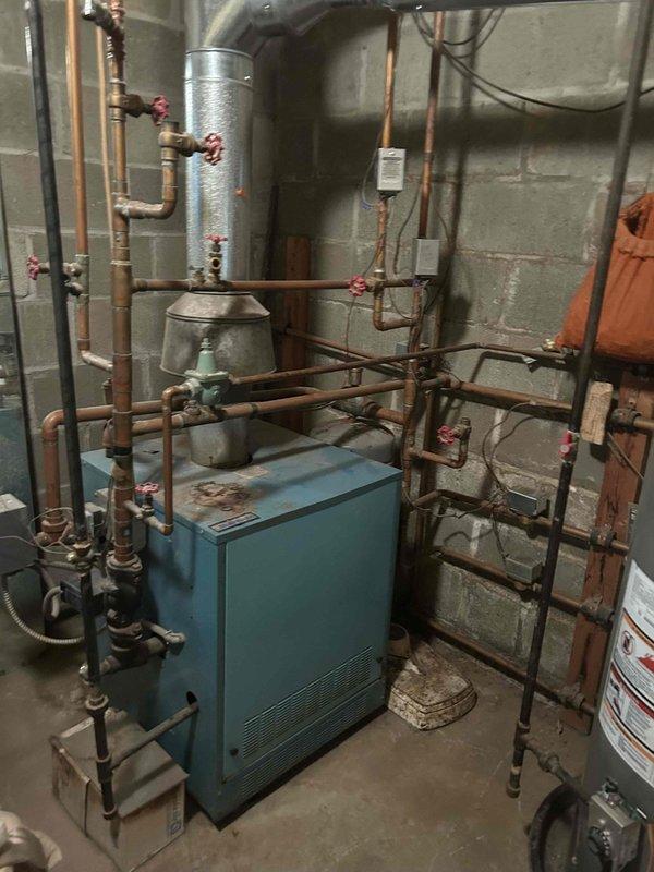 Installed air vents on existing boiler heating system as previously quoted. Added necessary venting components to the copper piping network to improve system air elimination and enhance overall heating efficiency and performance.