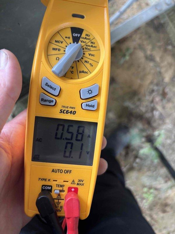 Completed cooling maintenance club member visit on air handler system. Performed electrical diagnostics using digital multimeter, recording amperage draw of 0.58A and voltage reading of 0.1V on initial measurement, followed by 565V AC reading on system components. Inspected HVAC equipment and documented system operating parameters to verify proper electrical performance and ensure unit is functioning within manufacturer specifications.