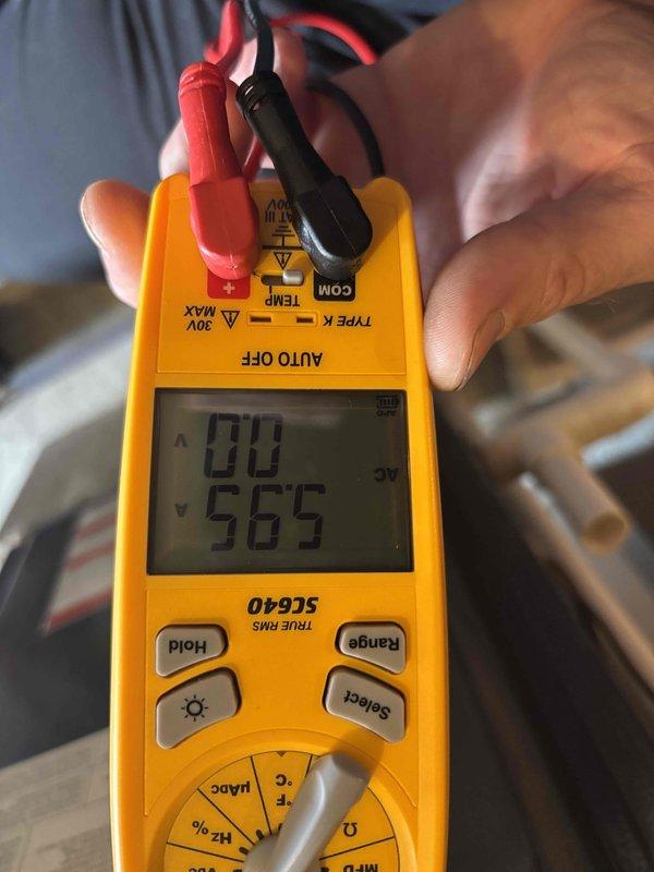 Completed cooling maintenance club member visit on air handler system. Performed electrical diagnostics using digital multimeter, recording amperage draw of 0.58A and voltage reading of 0.1V on initial measurement, followed by 565V AC reading on system components. Inspected HVAC equipment and documented system operating parameters to verify proper electrical performance and ensure unit is functioning within manufacturer specifications.