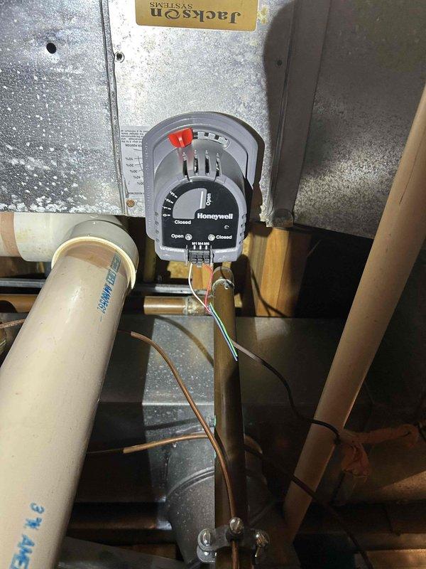 Responded to call for AC unit running continuously without cycling off. Performed system diagnostics including pressure measurements using digital manometer to verify proper airflow and static pressure levels within ductwork. Inspected motorized damper operation and confirmed proper functioning of zone control system with adequate electrical connections intact.