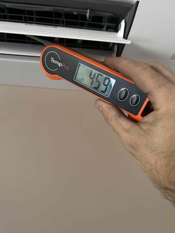 Completed cooling maintenance service on two Daikin ductless mini-split systems as part of club membership visit. Performed comprehensive preventive maintenance inspection on both indoor air handler units, including temperature verification and system performance testing. Supply air temperature measured at 45.9°F, confirming proper refrigerant charge and cooling operation. Inspected manufacturer labels and refrigerant information tags on equipment to verify system specifications and proper refrigerant charging. Both units operating within normal parameters with no deficiencies noted at time of service.