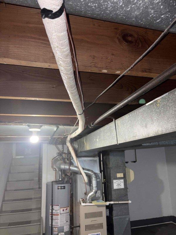 Responded to service call for air conditioning unit with non-operational fan. Performed diagnostic assessment of HVAC system located in basement utility area, evaluated mechanical components including furnace unit, ductwork connections, and related infrastructure. Generated estimate for complete system replacement based on equipment condition and operational requirements.