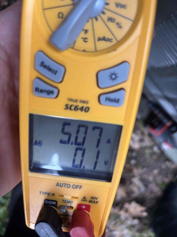 Completed comprehensive AC tune-up on 6-year-old system under maintenance contract. Performed standard inspection procedures including filter examination and electrical testing, recording current draw of 5.07A and voltage readings. Identified and resolved condensate trap leak by cleaning the trap, which successfully stopped the leakage, restoring proper drainage function.