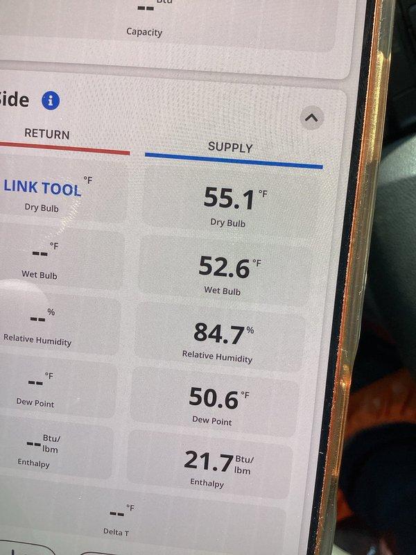 Responded to callback for thermostat calibration issue following recent maintenance visit. Upon arrival, verified thermostat display reading 78-79°F while occupants reported uncomfortably cold conditions. Used Fieldpiece temperature probe to measure actual room temperature and confirmed significant discrepancy between thermostat reading and ambient conditions. Checked supply air temperature at 55.1°F with 84.7% relative humidity, confirming system was overcooling space due to inaccurate thermostat sensing. Recalibrated thermostat temperature sensor to match actual room conditions and verified proper system cycling.