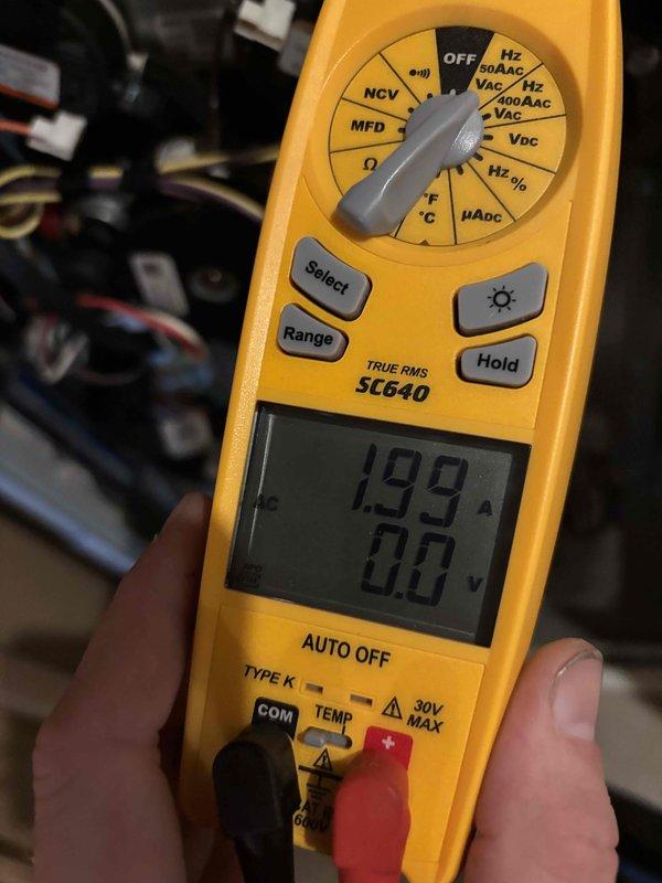 Completed routine cooling maintenance member visit on HVAC system. Performed electrical diagnostics using digital multimeter, measuring voltage readings of 179.9V and 12.3V, as well as amperage readings of 199A to verify proper system operation and electrical component functionality. All measurements documented photographically for service records.