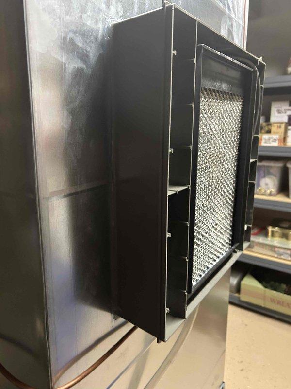 Responded to complaint of loud noises and system strain from indoor air handler unit. Performed diagnostic assessment using digital manometer to measure static pressure across the system, revealing elevated pressure differential readings. Inspected air handler cabinet and filter assembly, finding restricted airflow through the filtration system. Addressed airflow restriction issue to restore proper system operation and reduce mechanical strain on the equipment.