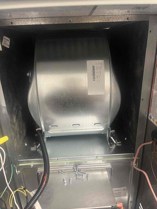 Completed removal and replacement of blower motor assembly including housing and wheel components. Materials were ordered and received prior to installation. System restored to cooling operation following blower motor replacement, though unit exhibits operational noise that will require monitoring.