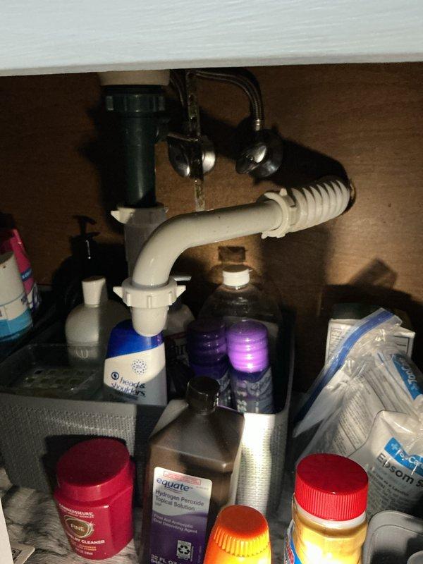 Returned to property to perform Mini Jetter service on kitchen sink drain line as previously sold. Successfully deployed mini jetter equipment through the kitchen sink drain system to clear blockage and restore proper drainage. Verified all under-sink plumbing connections remained secure and leak-free following jetting procedure, with garbage disposal unit and P-trap assembly functioning correctly.