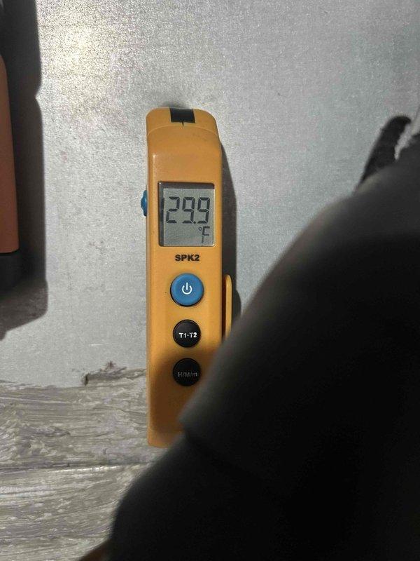 Responded to no heat call for furnace with intermittent heating operation. Upon inspection, discovered flame sensor was reading high temperature of 299°F, indicating excessive buildup preventing proper flame detection. Removed and cleaned flame sensor probe to restore proper conductivity and flame sensing capability. Verified sensor reinstallation and tested system through multiple heating cycles to confirm reliable ignition and continuous operation. System restored to normal heating function.