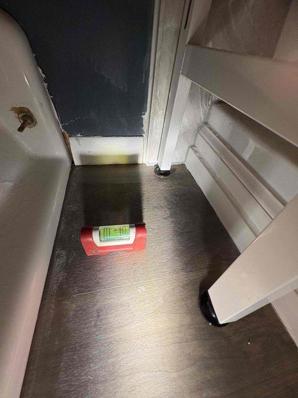 Responded to service call for recurring leak on wall-mounted toilet fixture in half bath. Upon inspection, assessed the condition of the existing installation and surrounding area to determine the extent of water damage and underlying issues causing repeated failures. Documented current state of fixtures and flooring for comprehensive bathroom remodel estimate. Evaluated structural conditions, wall integrity, and flooring surfaces to provide accurate scope of work for complete half bath renovation that will address chronic leaking issues and prevent future water damage.