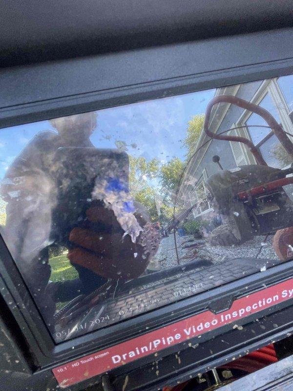 Performed video camera inspection of main drain line to assess condition and identify blockages. Successfully located and documented pipe interior at 114 feet using specialized inspection equipment, confirming line accessibility and structural integrity.