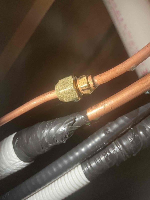 Completed installation of a single-head Daikin mini-split system. Installed indoor wall-mounted evaporator unit, ran refrigerant line set with proper insulation, made copper pipe connections using brass compression fittings, and routed electrical and drain lines through conduit. System was tested and confirmed operational.