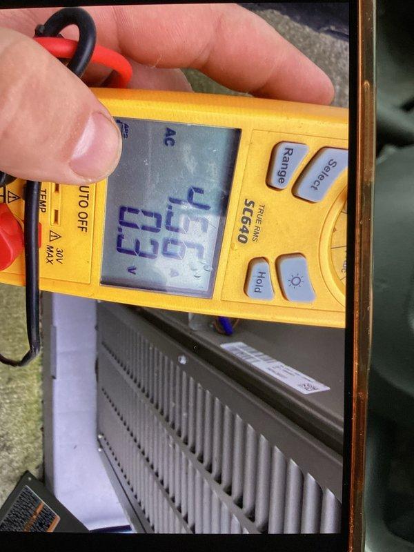 Completed prepaid club maintenance visit on air handler unit. Performed diagnostic testing of electrical components using digital multimeter, recording temperature and amperage readings to verify proper system operation. Inspected evaporator coil assembly, confirming fins were clean and free of debris with proper spacing maintained throughout. All components operating within normal parameters at time of inspection.