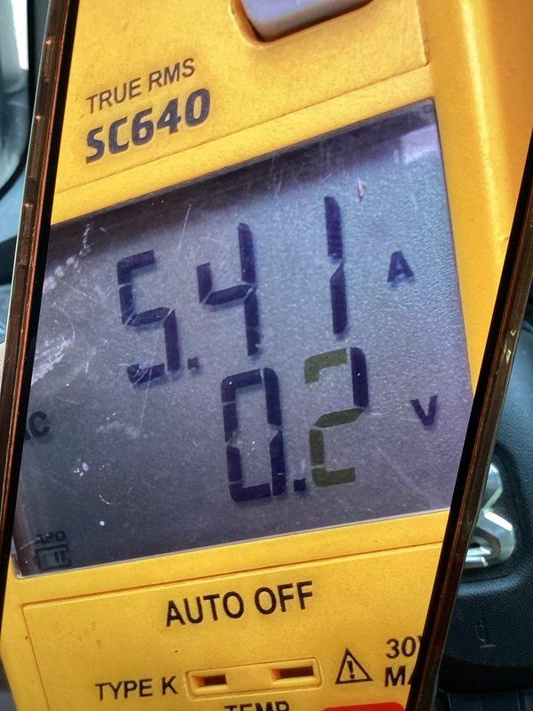 Completed routine cooling maintenance member visit for air handler system. Upon arrival, discovered significant water accumulation in utility area surrounding condensate drain lines, indicating drainage issue. Inspected PVC condensate drain piping and connections, noting standing water conditions affecting equipment accessibility. Performed diagnostic measurements using digital multimeter to verify system electrical parameters, recording voltage and amperage readings to confirm proper operation of air handler components. Addressed water drainage concerns and documented flooded conditions for follow-up remediation.