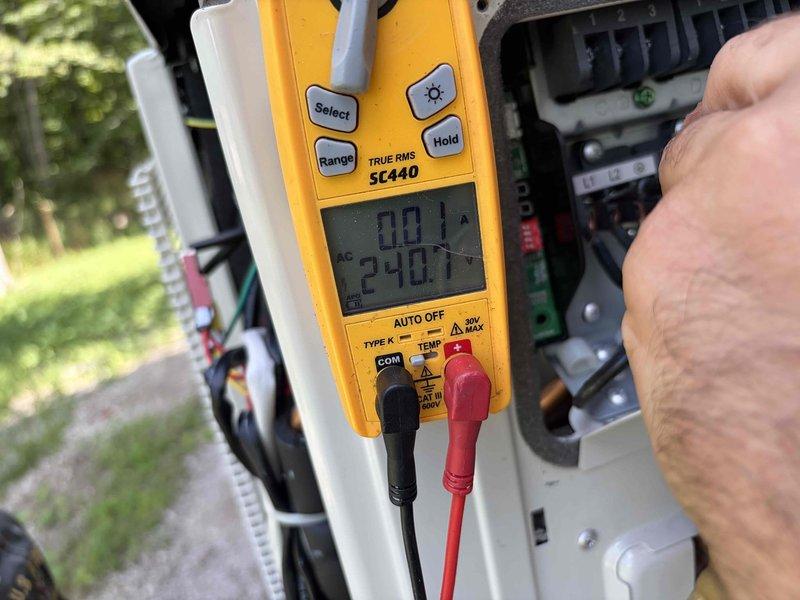 Responded to Error PC-02 on Mr. Cool DIY 30,000 BTU mini split system. Customer encountered issues during self-installation and required professional assistance to diagnose and resolve the error code. Verified proper voltage at 240V AC using digital multimeter at the outdoor unit. Inspected internal wiring connections and terminal block, confirming all wire terminations were secure and properly seated in their respective connectors. Cleared the PC-02 error code and restored system to normal operation.