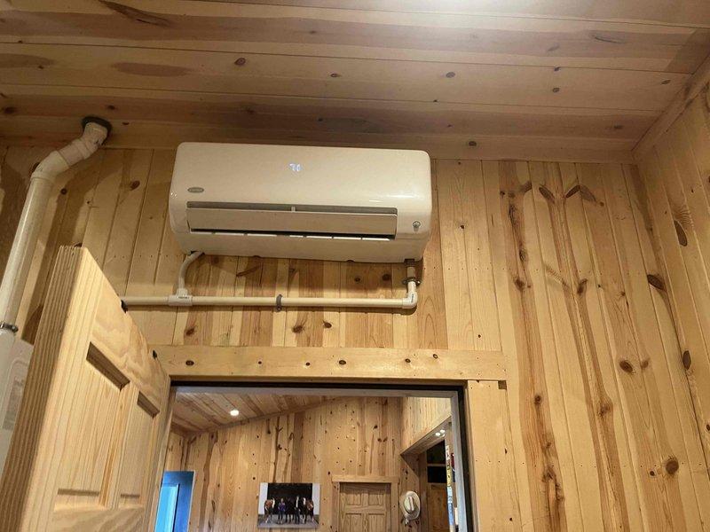 Responded to callback for leaking mini-split unit in tack room. Upon inspection, identified condensate drainage issue causing water leakage from indoor air handler. Cleared condensate drain line obstruction and verified proper drainage flow. Unit tested and operating without leaks at time of departure.