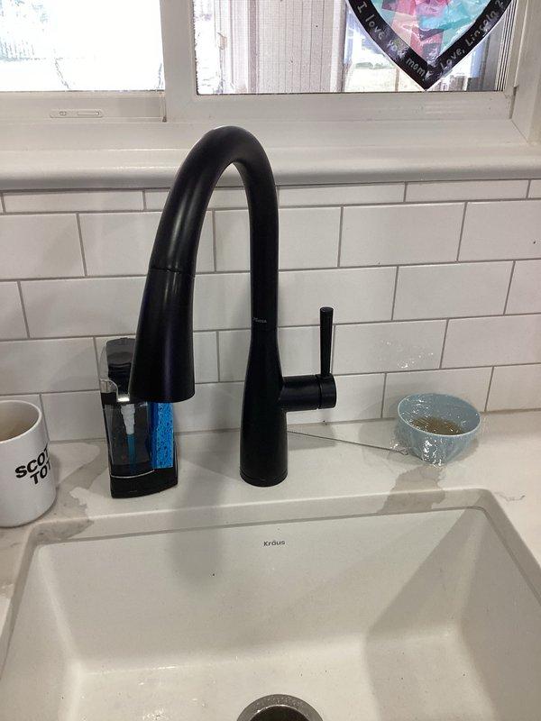 Performed camera inspection on kitchen sink drain line to diagnose clog located below garbage disposal unit. Video inspection revealed blockage in drain line, documented findings with photographic evidence of affected sink and surrounding plumbing fixtures for service records.