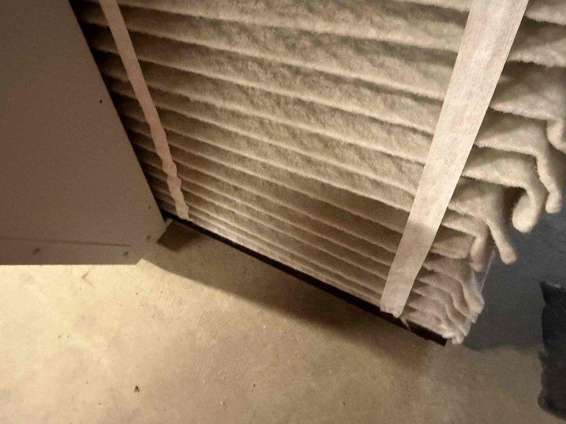 Completed routine cooling maintenance member visit on air handling system. Inspected and photographed heavily soiled air filter showing significant dust and debris accumulation, requiring replacement to maintain proper airflow and system efficiency. Verified exterior electrical disconnect and condensing unit connections, documented PVC condensate drain lines in proper working condition with no visible blockages or leaks.