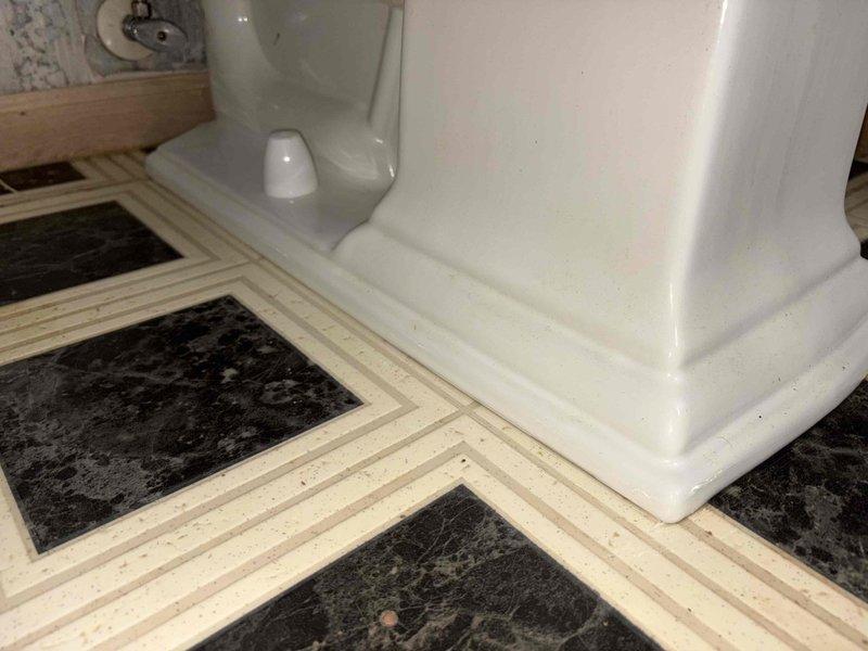 Responded to clogged bathroom drain call in 1992-built residential property. Customer had attempted unsuccessful clearing prior to service visit. Upon arrival, performed diagnostic assessment of bathroom plumbing system including toilet and sink drainage. Utilized professional drain clearing equipment and techniques to remove blockage from affected fixtures. Inspected water supply lines and plumbing connections for proper function and potential issues. Cleared obstruction successfully, restoring full drainage capability to bathroom fixtures. Verified proper water flow and drainage operation upon completion. Documented site conditions with photographic records showing bathroom fixtures, flooring, and plumbing connections. All fixtures returned to normal operating condition.