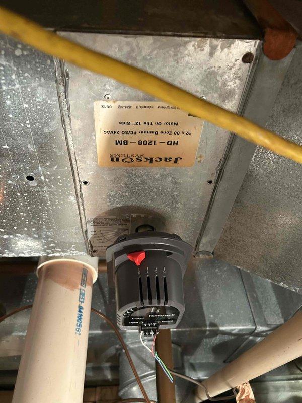 Completed replacement of four motorized zone dampers and associated control valves in the HVAC duct system as previously sold. Installed Jackson HD-1208-BM dampers with motorized actuators at designated zones throughout the ductwork. Verified proper damper operation, wiring connections, and zone control functionality. Performed airflow measurements at supply registers using anemometer to confirm adequate CFM delivery and proper system balancing after installation.