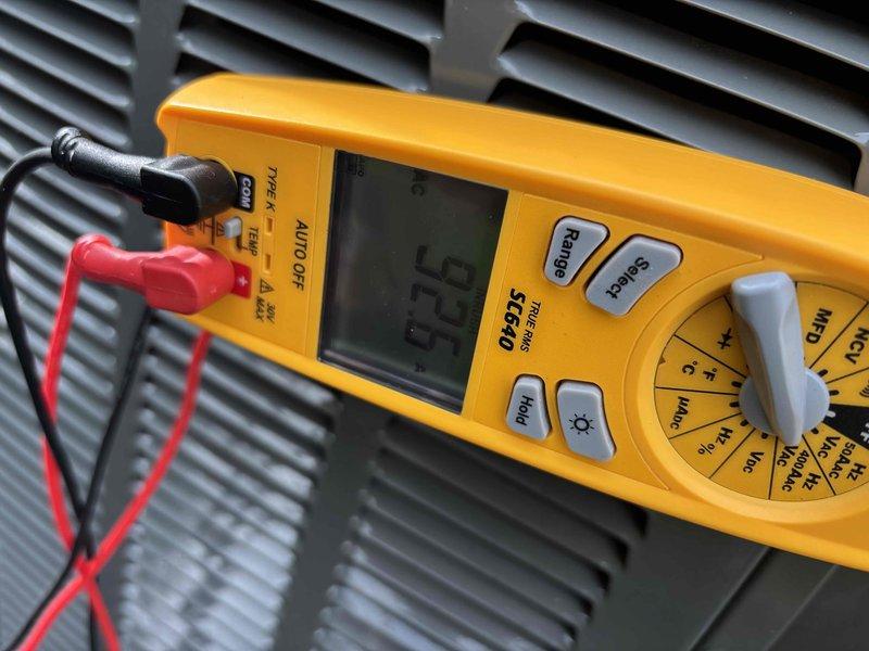 Completed club maintenance visit on air handler unit. Performed standard diagnostic testing using digital multimeter to verify system electrical parameters. Measured and recorded amperage draw of 0.61 amps and temperature reading of 75°F to confirm proper system operation. All electrical components tested within normal operating range. Unit operating as designed with no issues identified during inspection.