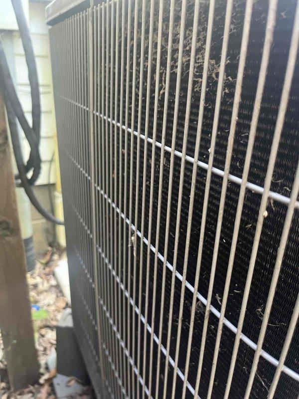 Responded to no cooling complaint with visible ice formation on outdoor unit. Upon arrival, confirmed evaporator coils were frozen over. Instructed system shutdown to allow complete thaw. Identified restricted airflow as primary cause due to dirty air filter and contaminated evaporator coil. Replaced air filter and performed thorough coil cleaning. Verified system operation with digital thermometer reading 72.5°F at supply register. System resumed normal cooling operation after service. Customer reported continued satisfactory performance following initial repair. Scheduled preventative maintenance visit to ensure optimal system performance and prevent future freeze-ups.