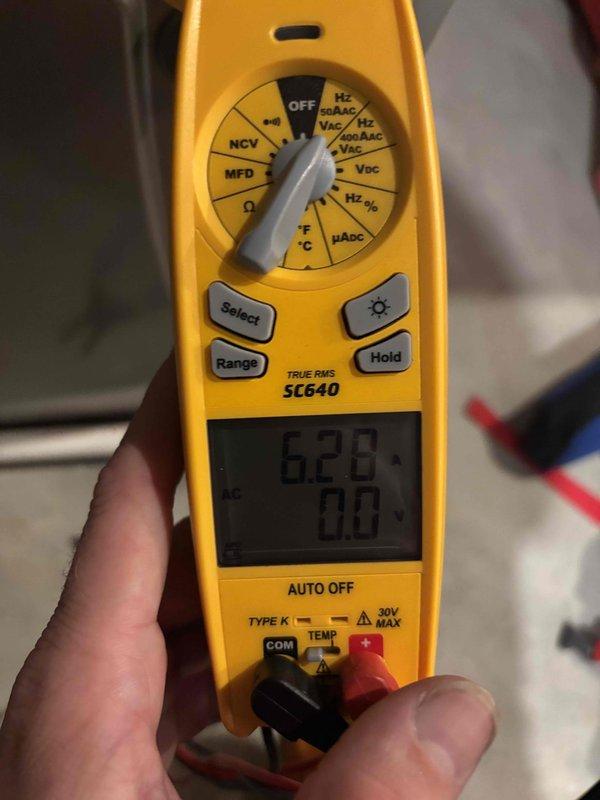 Completed comprehensive air conditioning tune-up and system evaluation on air handler unit. Performed electrical diagnostics using digital multimeter, measuring voltage and amperage readings to verify proper system operation and component performance. All measurements confirmed equipment operating within manufacturer specifications.