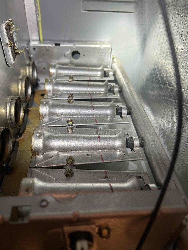 Returned to property to complete previously sold burner replacement on heating system. Successfully replaced all five burners as scheduled after material arrival, performed combustion analysis testing using Testo 310 analyzer which confirmed proper CO levels and system operation, and completed heating club maintenance verification per service agreement requirements.
