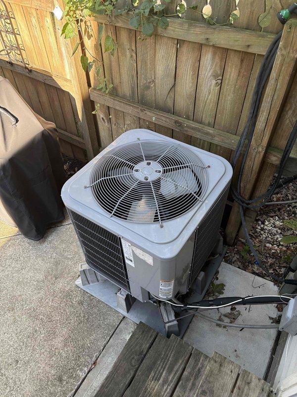Responded to no cooling complaint with visible ice formation on heat pump system. Upon arrival, confirmed evaporator coils were frozen over with fan running but no cooling output. Instructed system shutdown to allow coils to thaw. Replaced dirty air filter and performed coil cleaning on air handler unit located in basement. System airflow restored and cooling operation resumed normally. Recommended ongoing preventative maintenance program to prevent future freezing issues and ensure optimal heat pump performance.
