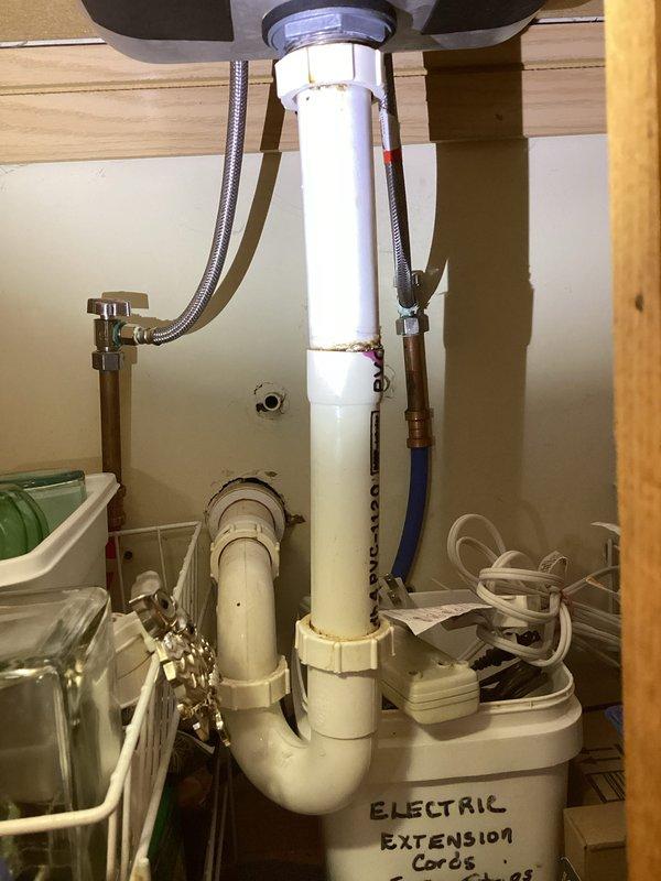 # Tankless Water Heater Maintenance Service

Performed comprehensive maintenance service on tankless water heater system. Conducted descaling flush procedure to remove mineral buildup and maintain optimal heat exchanger efficiency. Tested water quality parameters using calibrated digital meter, confirming pH levels at 6.0. Inspected all plumbing connections, supply lines, and shut-off valves under fixture for proper operation and potential leaks. System restored to full functionality with improved flow rate and heating performance.