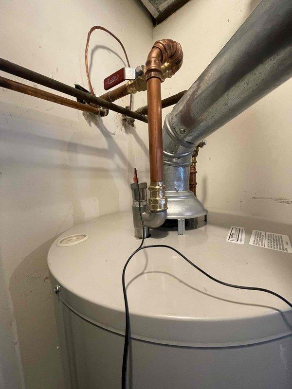 Performed anode rod replacement on a 40-gallon Bradford White gas water heater, Model RG240T6X. Removed deteriorated anode rod and installed new replacement rod to prevent tank corrosion and extend unit lifespan. Inspected all plumbing connections, expansion tank, and gas supply lines during service to ensure proper operation and system integrity.