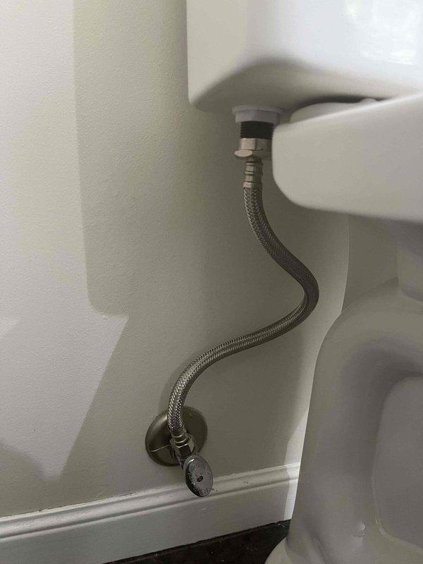 Completed plumbing bundle service including toilet installation and sump pump replacement. Installed new toilet with braided stainless steel flexible water supply line, chrome shut-off valve, and proper wall connections, ensuring all fixtures were securely mounted and leak-free. Removed old sump pump unit showing significant dust accumulation and replaced with new equipment, utilizing protective sheeting to maintain cleanliness during the extraction and installation process.