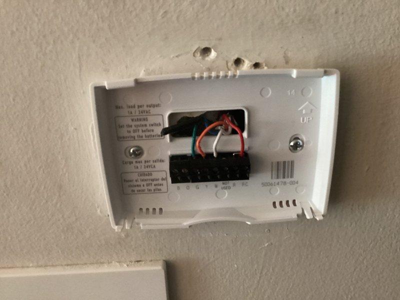 Conducted comprehensive assessment of existing HVAC system for replacement estimate, including 40-year-old furnace and 38-year-old air conditioning unit that recently ceased operation. Documented current equipment conditions, thermostat wiring configuration, and outdoor condenser unit placement for system replacement planning. Provided detailed replacement options and recommendations for complete heating and cooling system upgrade.