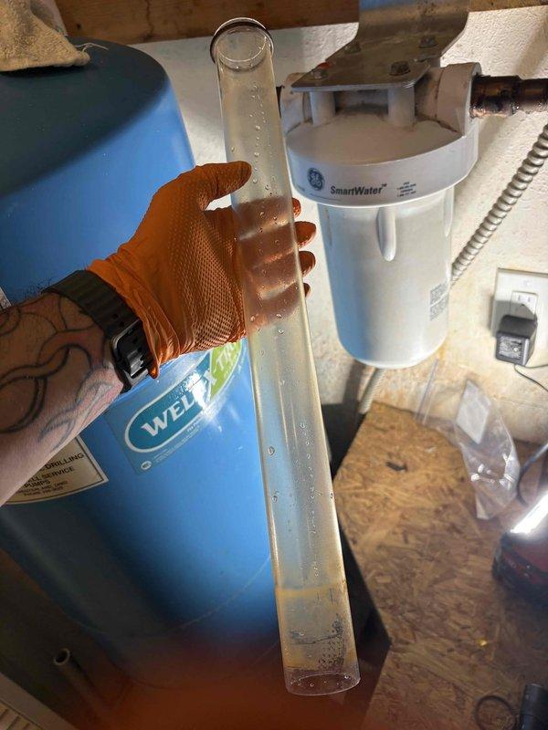 Completed UV water treatment system service by replacing the UV bulb and lens assembly on the water filtration system. Removed and reinstalled the clear quartz lens housing from the UV sterilization unit, ensuring proper seating and seal to maintain system effectiveness. System was tested and verified operational upon completion of the bulb and lens replacement.
