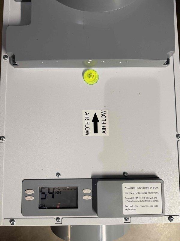 Completed system upgrade installation including REME HALO air purification unit with aGHP-Cell technology. Installed and configured air purification system with proper electrical connections to 24VAC supply, verified LED indicator operation, and ensured correct airflow direction alignment on HVAC equipment panel with integrated digital control display showing operational status at -54%.