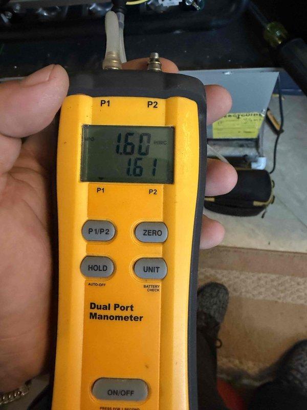 Completed annual heating maintenance member visit on residential HVAC system. Performed comprehensive system diagnostics including temperature differential measurements using digital multimeter, recording 52.7°F reading, and static pressure testing with dual port manometer showing balanced readings of 160-161 inWC. All equipment operating within manufacturer specifications with no deficiencies noted.